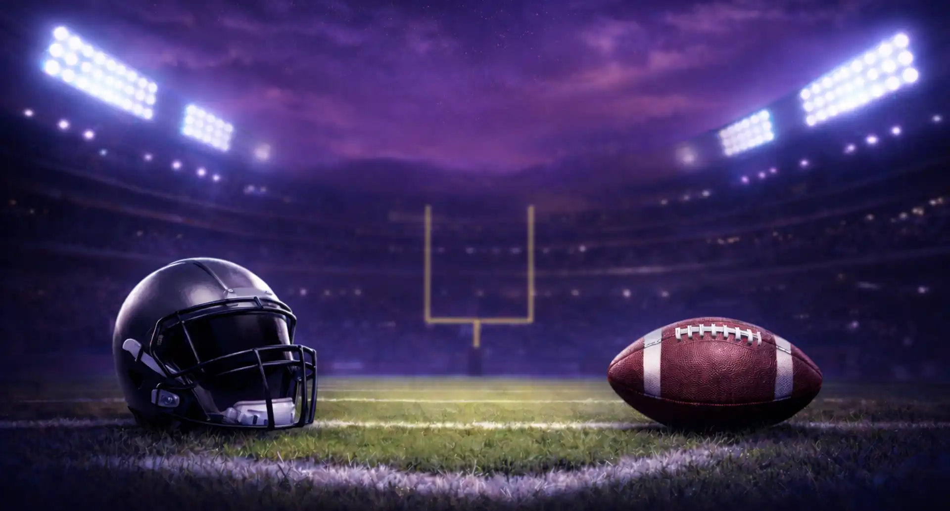 Football and helmet displayed on field